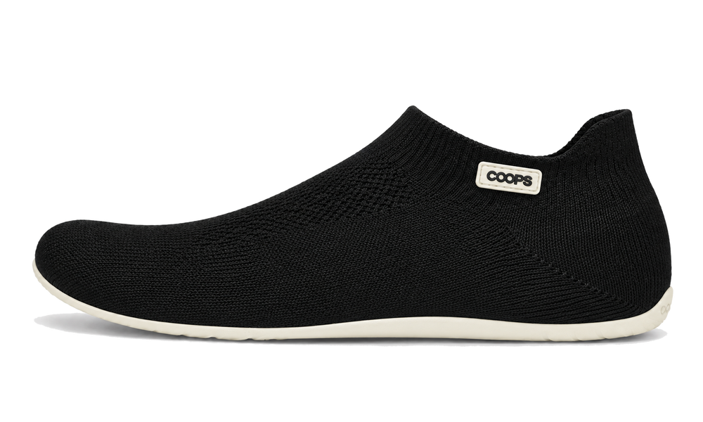 Black COOPS low top sock shoe, side profile