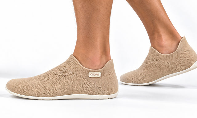 COOPS Low Top in Sand, worn by a man, walking