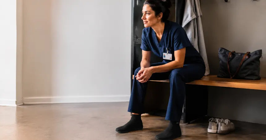 Healthcare worker changing into COOPS after a shift