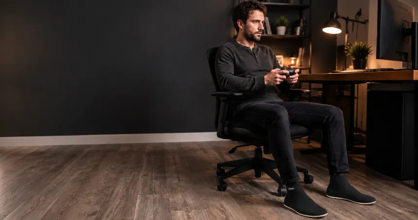 Adult gamer wearing comfortable COOPS gaming slippers